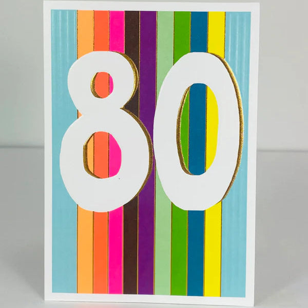 Colorful birthday card with the number 80 on a striped background
