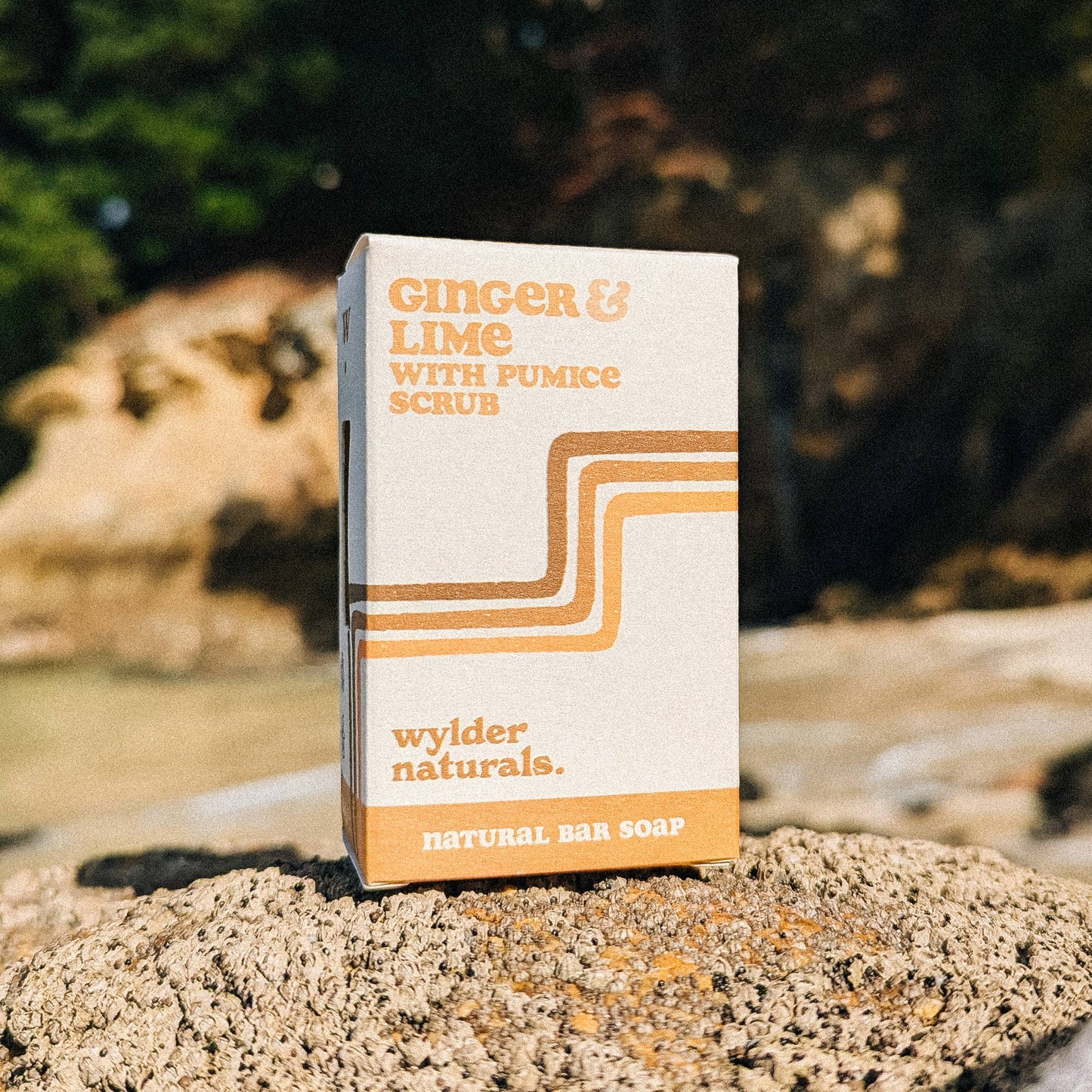 Soap packaging with subtle yellows and oranges