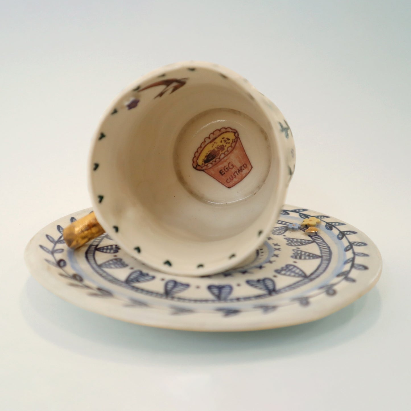 Cup and saucer showing detail of the inside of the sup