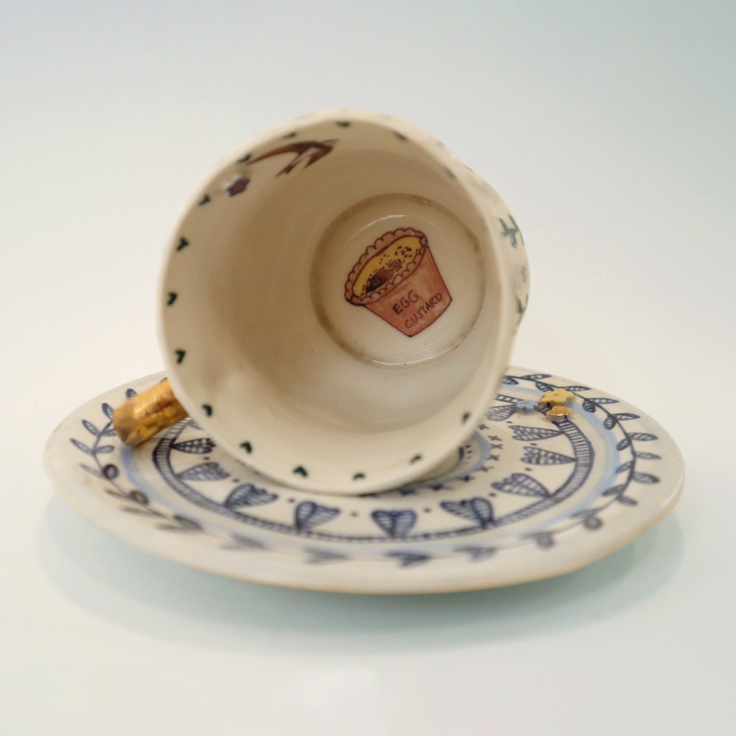 Cup and saucer showing detail of the inside of the sup