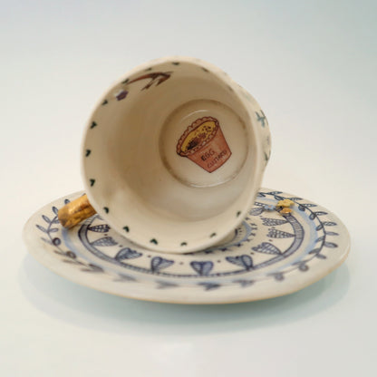 Cup and saucer showing detail of the inside of the sup