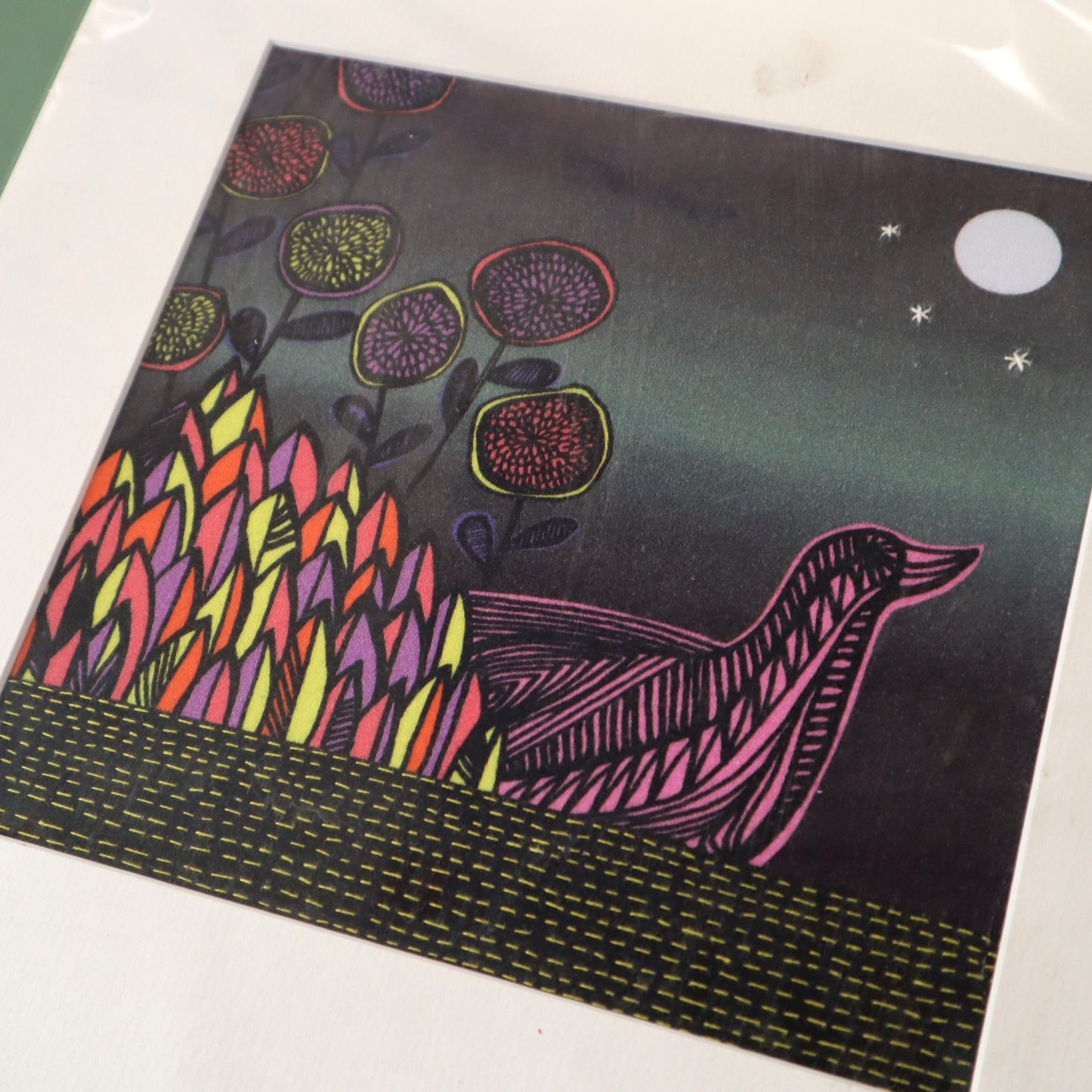 Artistic depiction of a bird and flowers on a dark background with a moon and stars.