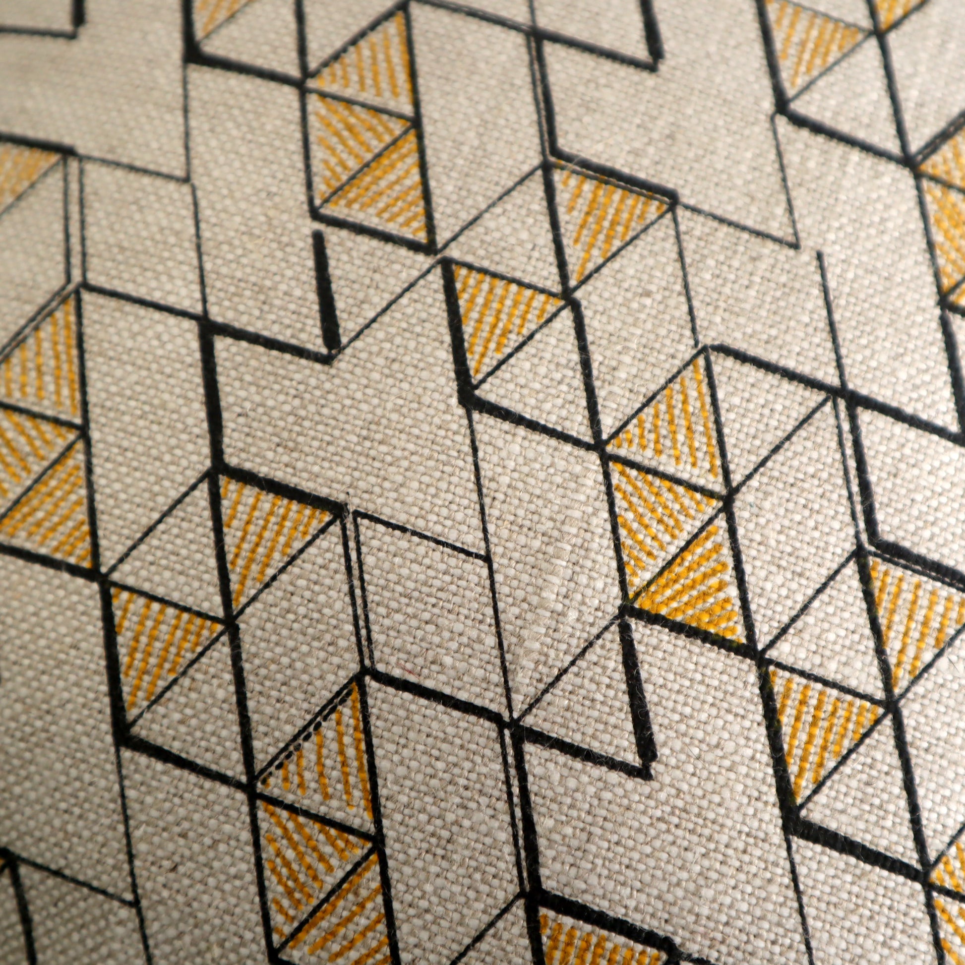 Geometric pattern with triangles in black, orange