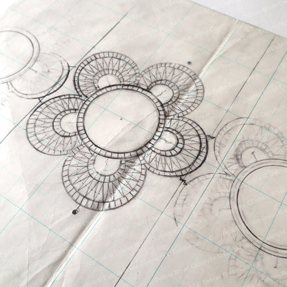 Technical drawing of a circular design on graph paper