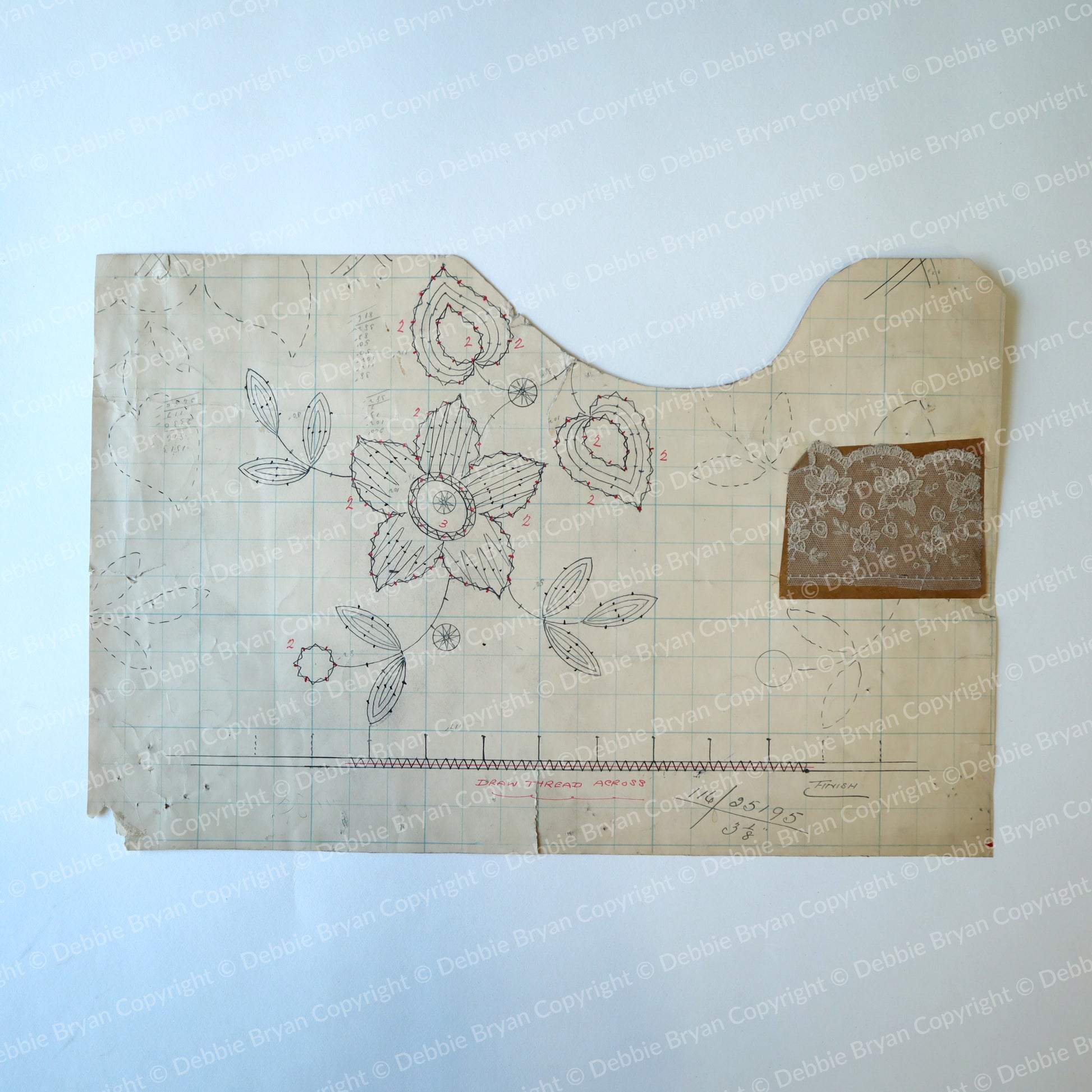 Vintage paper lace pattern with floral designs on a off white background