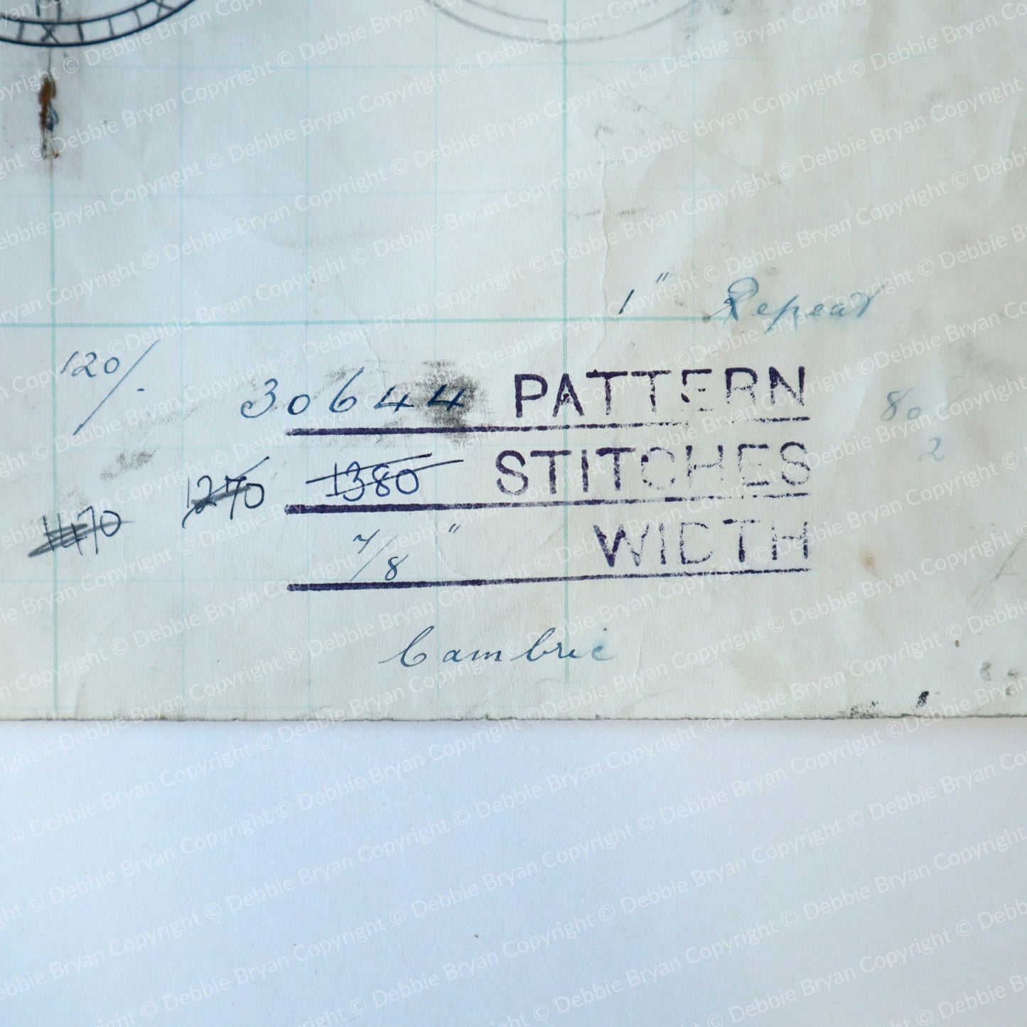 Text on paper with lace pattern details