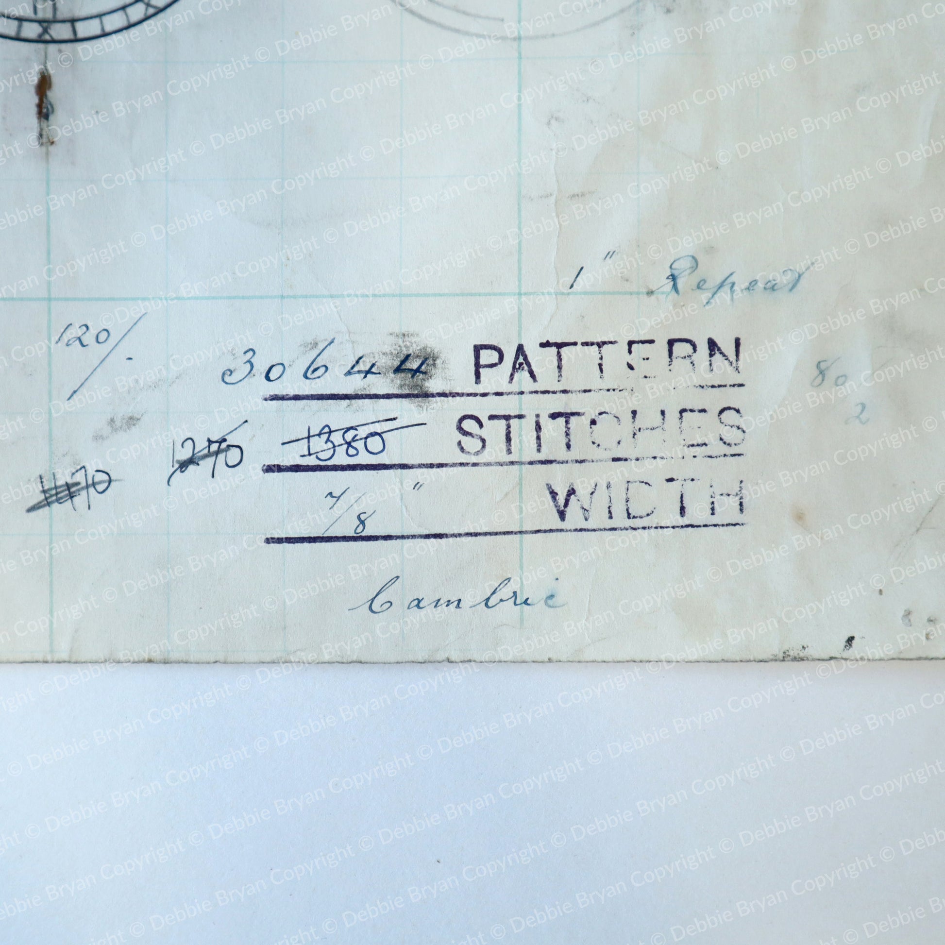 Text on paper with lace pattern details