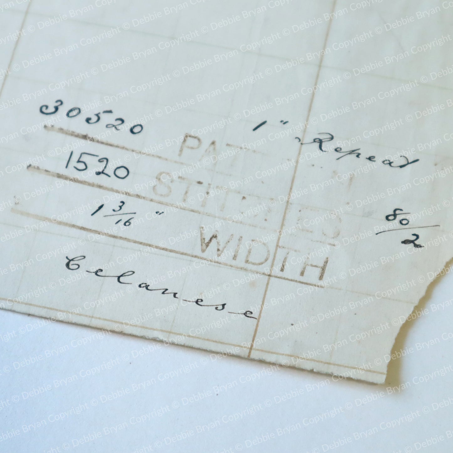 Textured off white paper with printed and handwritten text