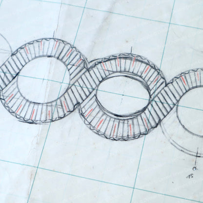 Technical drawing of a mechanical component on graph paper