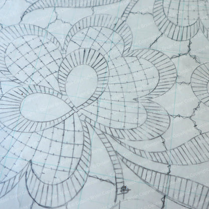 Technical drawing of a floral pattern on graph paper