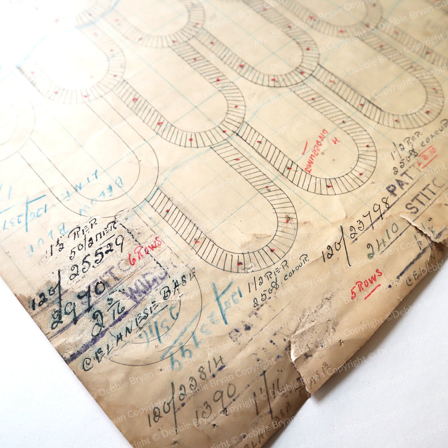 Vintage document with handwritten notes and diagrams on a white background