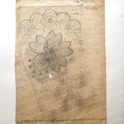 Vintage lace drawing on brown paper with measurements and text.