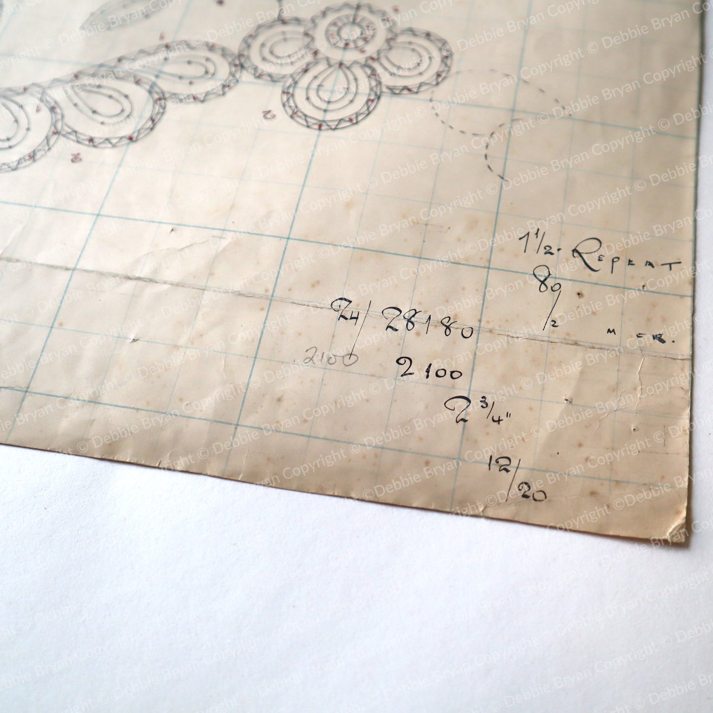 Floral lace design on a textured paper background