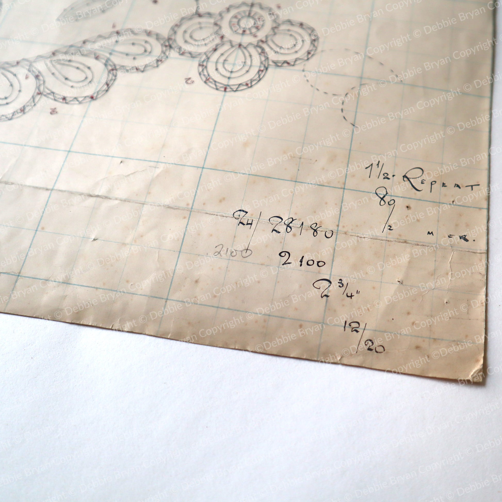 Floral lace design on a textured paper background