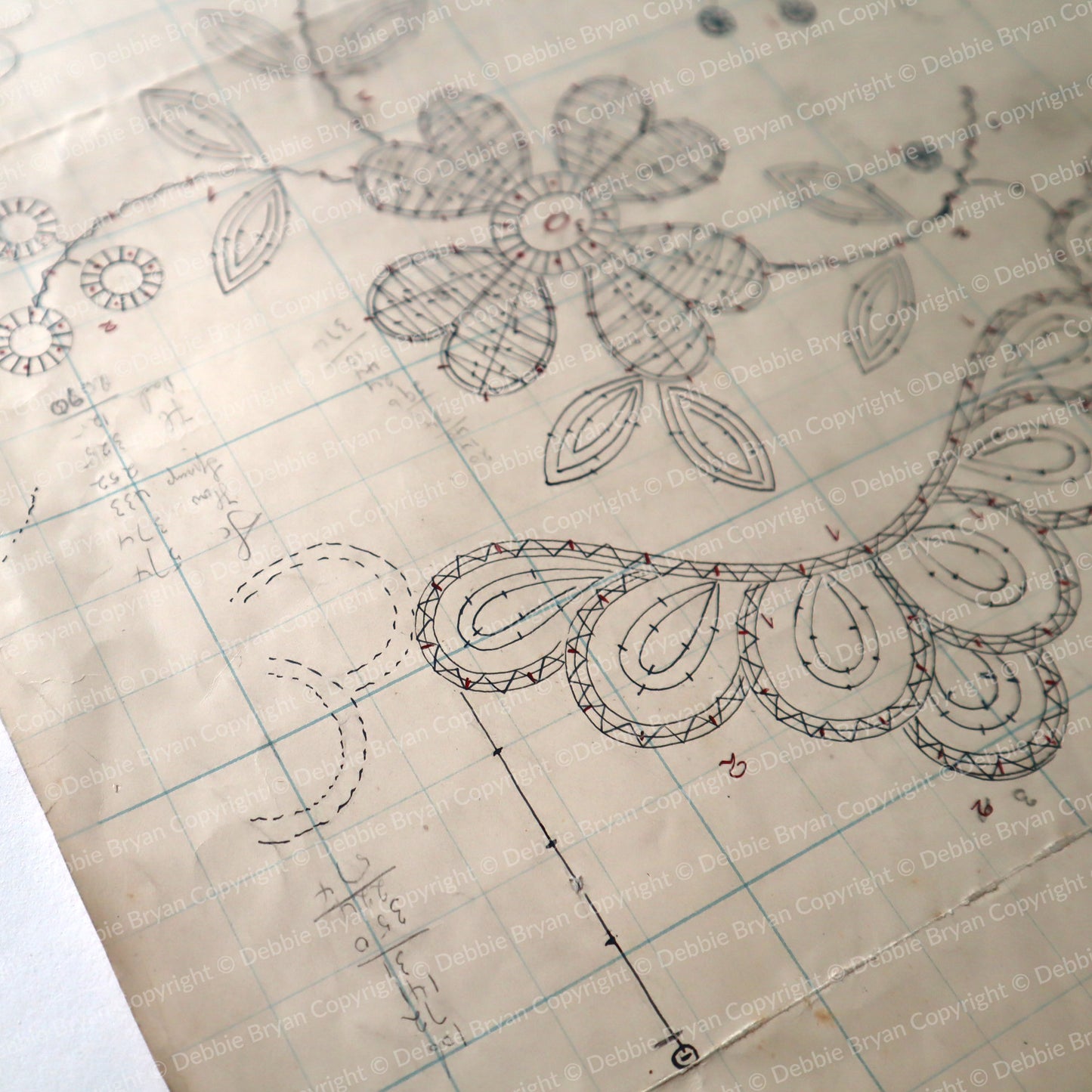 Floral lace design on a textured paper background