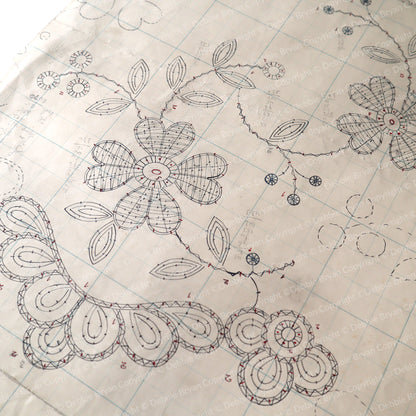 Floral lace design on a textured paper background