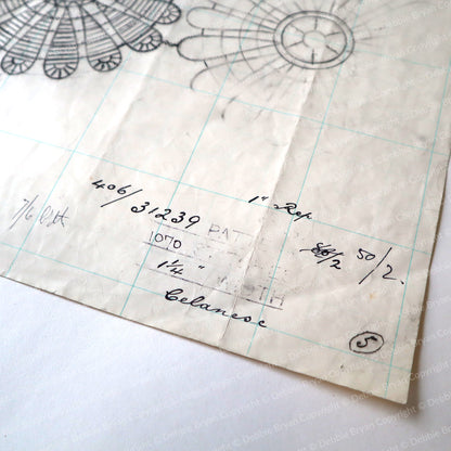 Vintage lace pattern with grid lines and handwritten notes on a white background