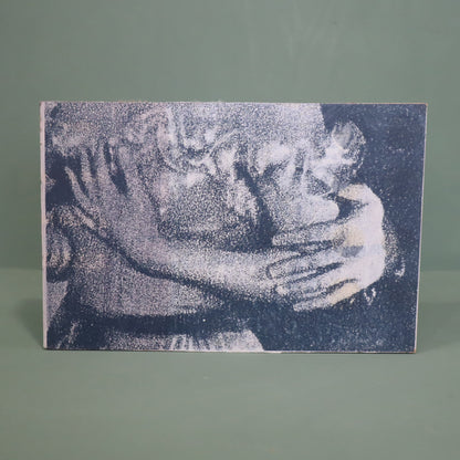 Textured artwork of a couple embracing on a gray background