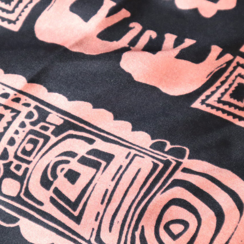 Close-up of pink and black tribal pattern fabric