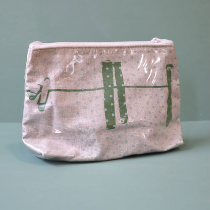 Linen washbag with plastic cover and an abstract green design of  a washing line