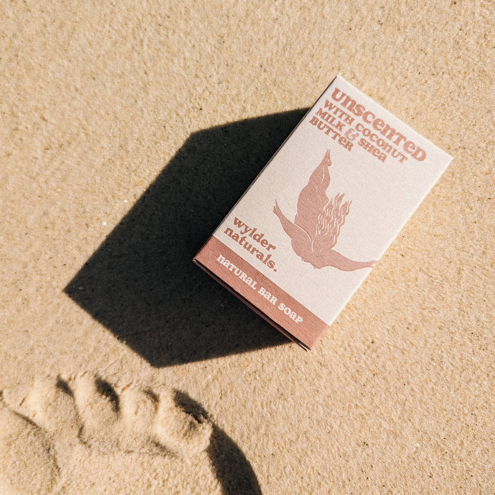 Soap box packaging on a sand background
